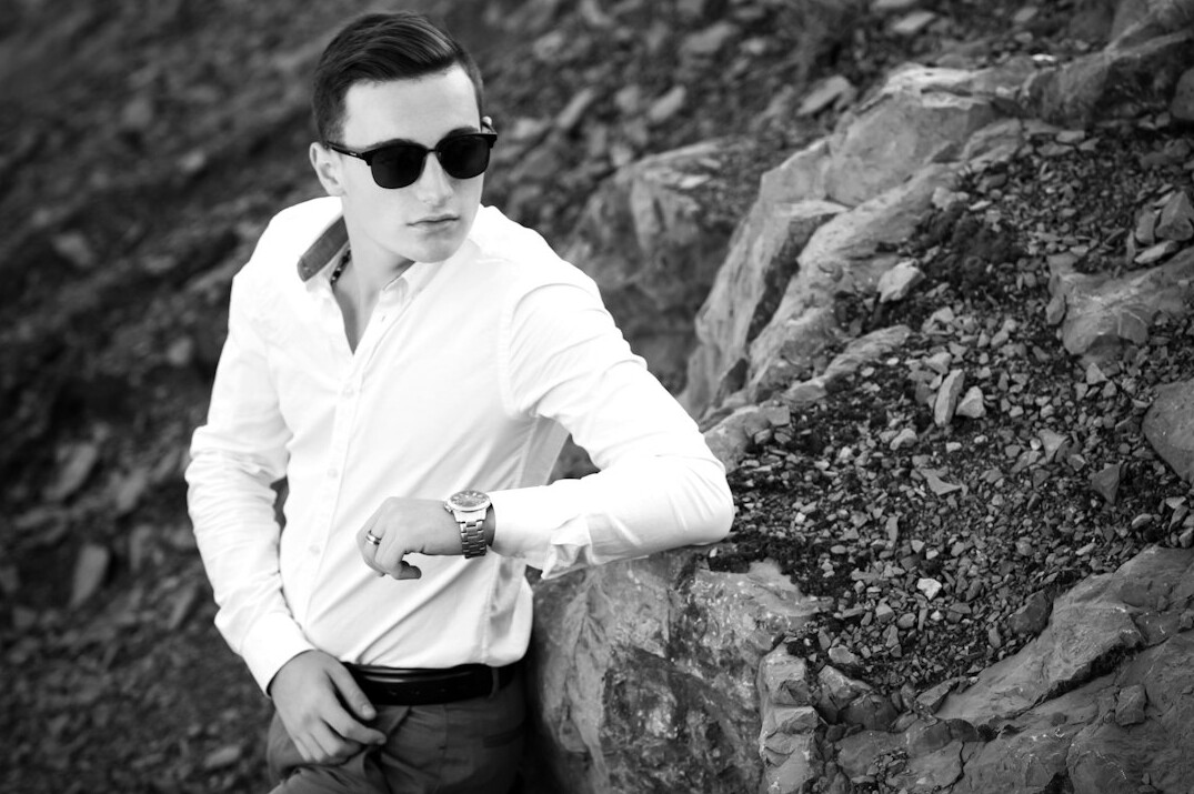 Studio portrait of a Chinese Singaporean man in a casual shirt