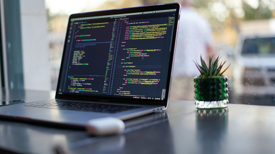 programmer coding insurance software
