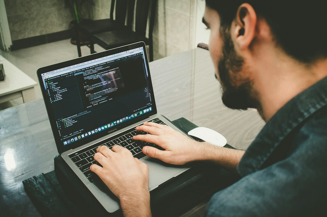 programmer working on insurance code
